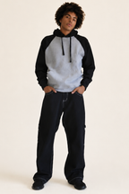 Wide leg carpenter jeans on a plain background