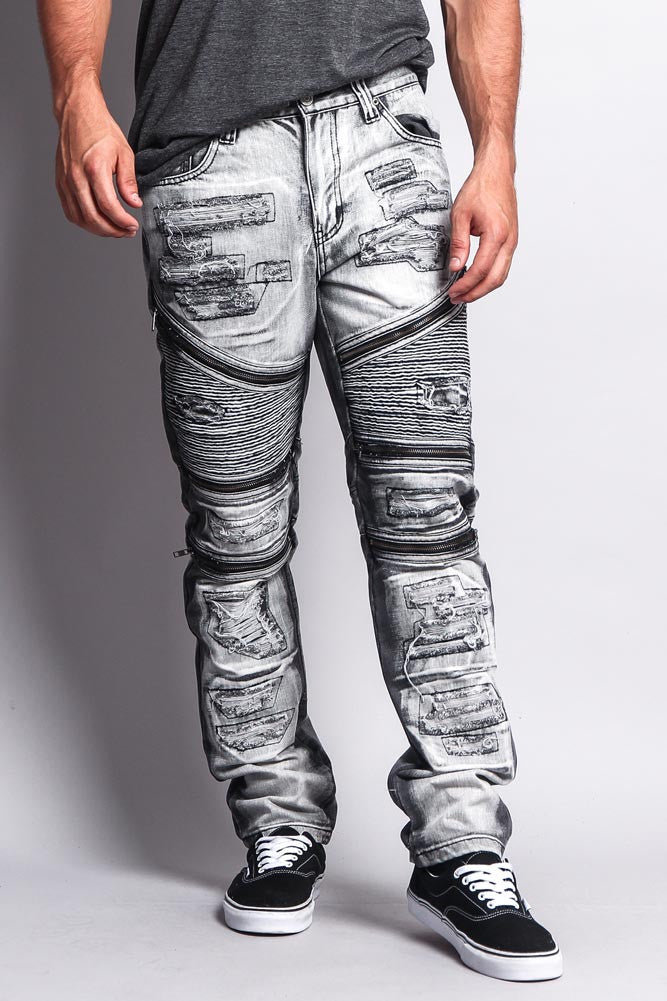 Pre-ripped washed jeans, front view