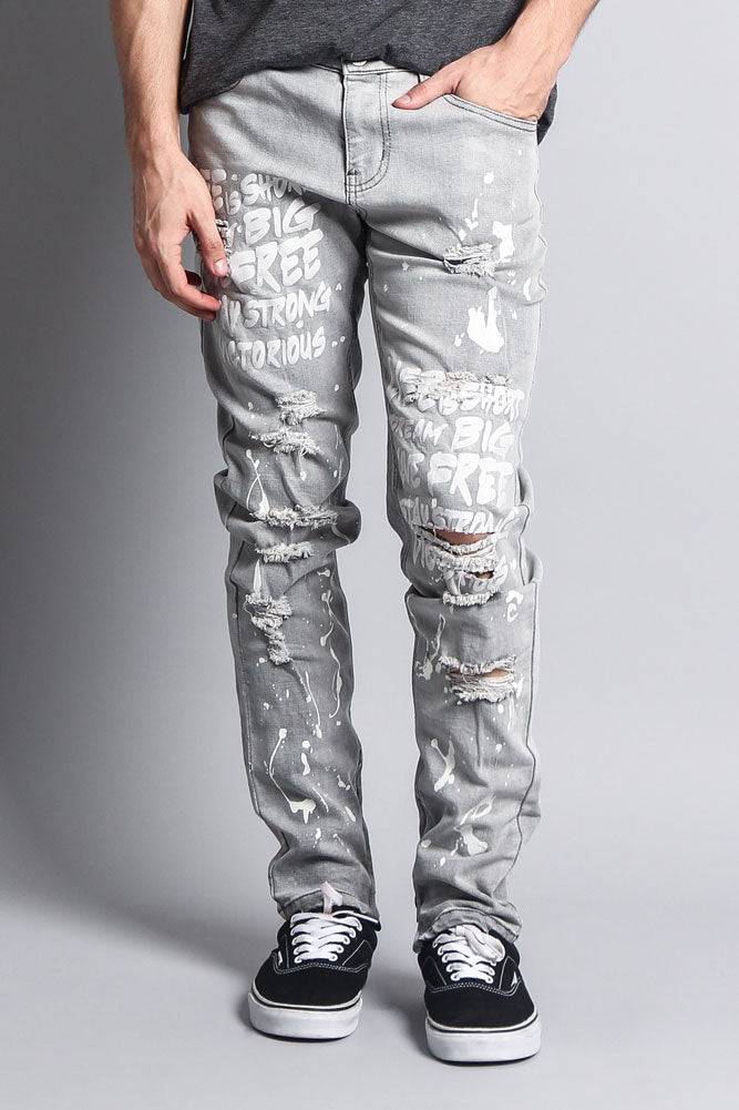 Bleach washed jeans with splatter and text
