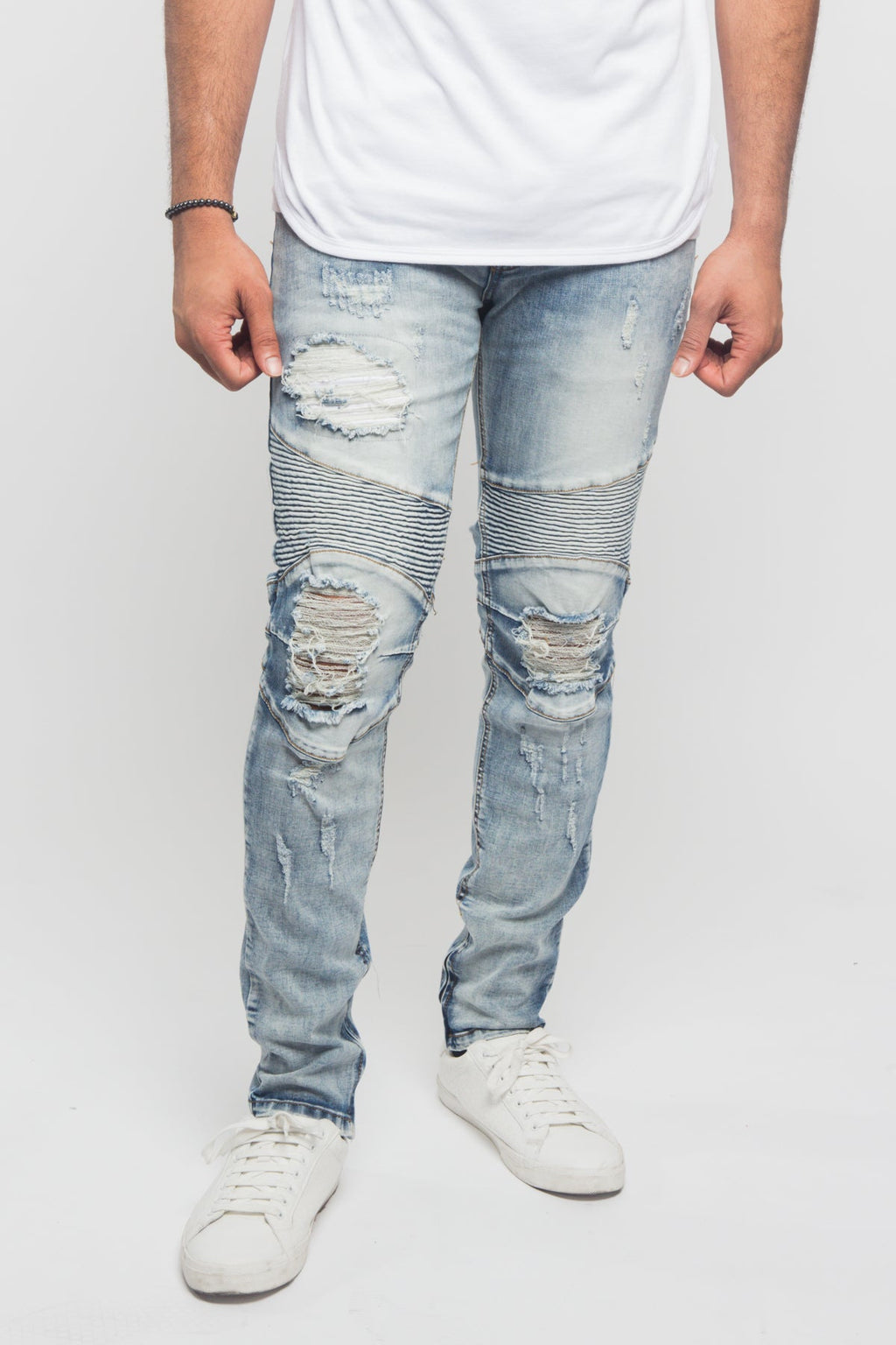 Threadbare surface worn thin at the knee