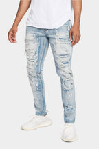 Light wash super skinny jeans worn front on