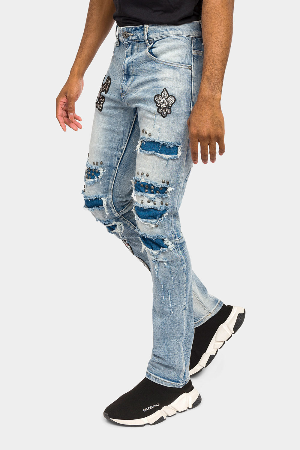 Stud and crystal patch detail on the leg