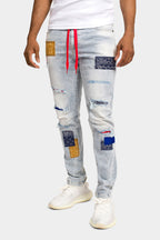 Ice blue skinny jeans worn front on